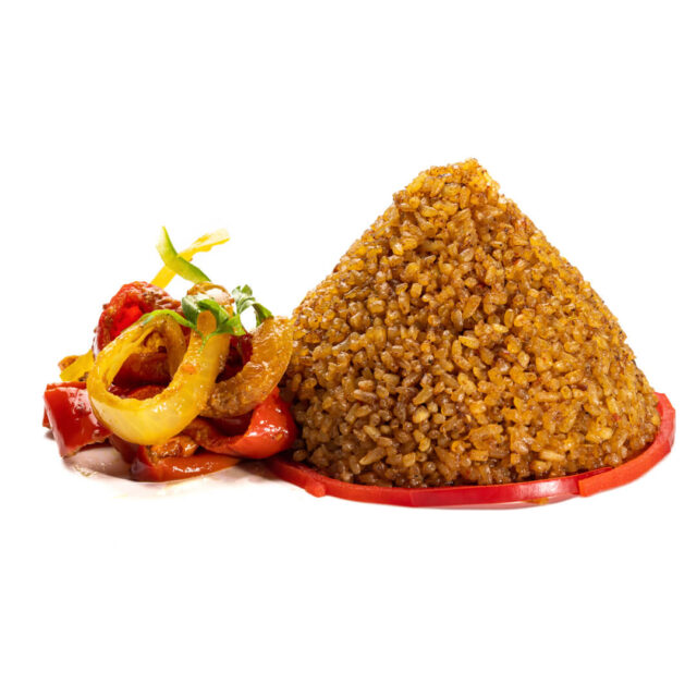 Tapa de arroz senegalés con cebolla caramelizada y legumbres salteadas de África Fusión. (Tapapiés)